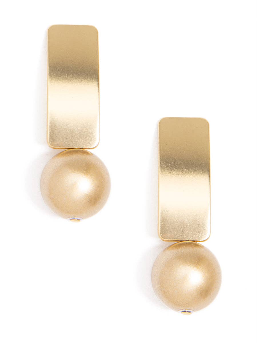 Gold earrings with spherical beads on a white background