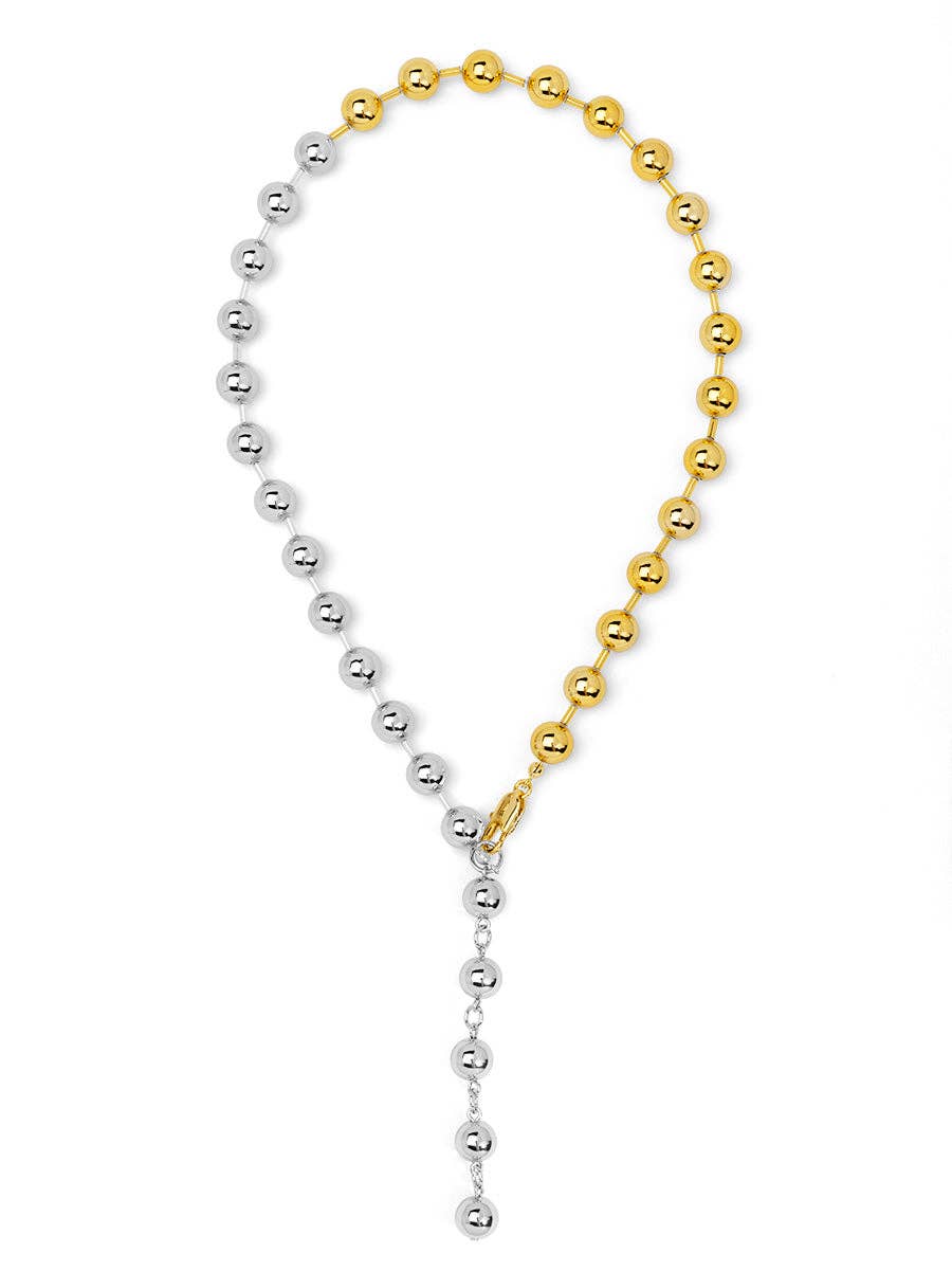Two necklaces, one gold and one silver, on a white background