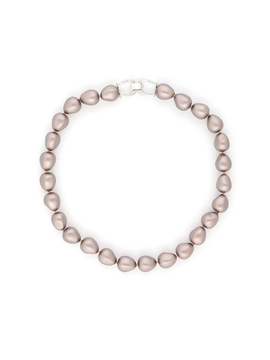 Pearl necklace on a white background