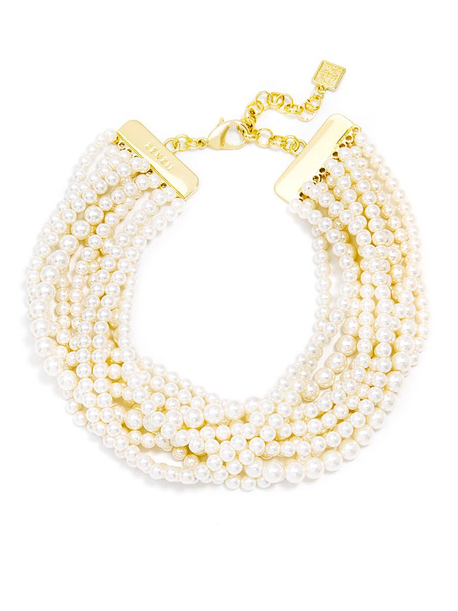 Pearl necklace with gold clasp on a white background