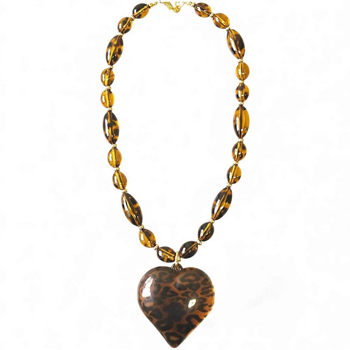 Necklace with leopard print heart pendant on a white background