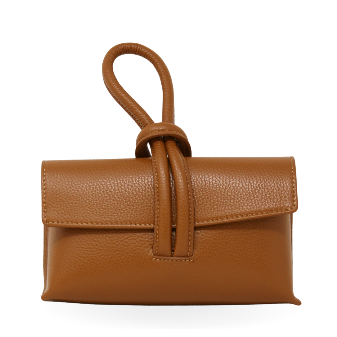 Brown leather handbag with a strap on a white background