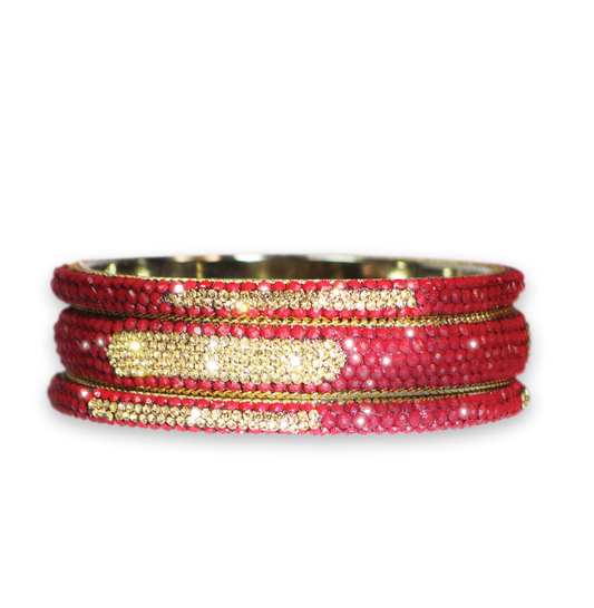 Red and gold beaded bracelet on a white background