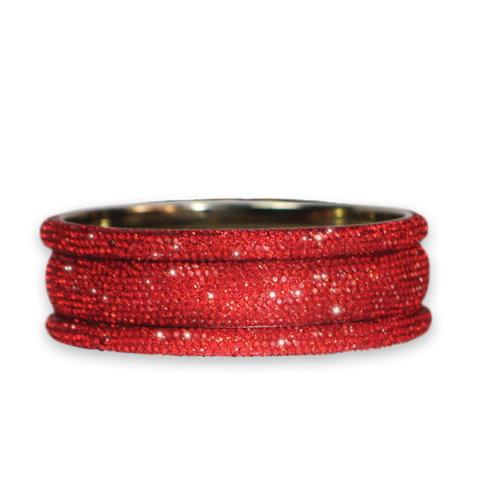 Red rhinestone bangles on a white background