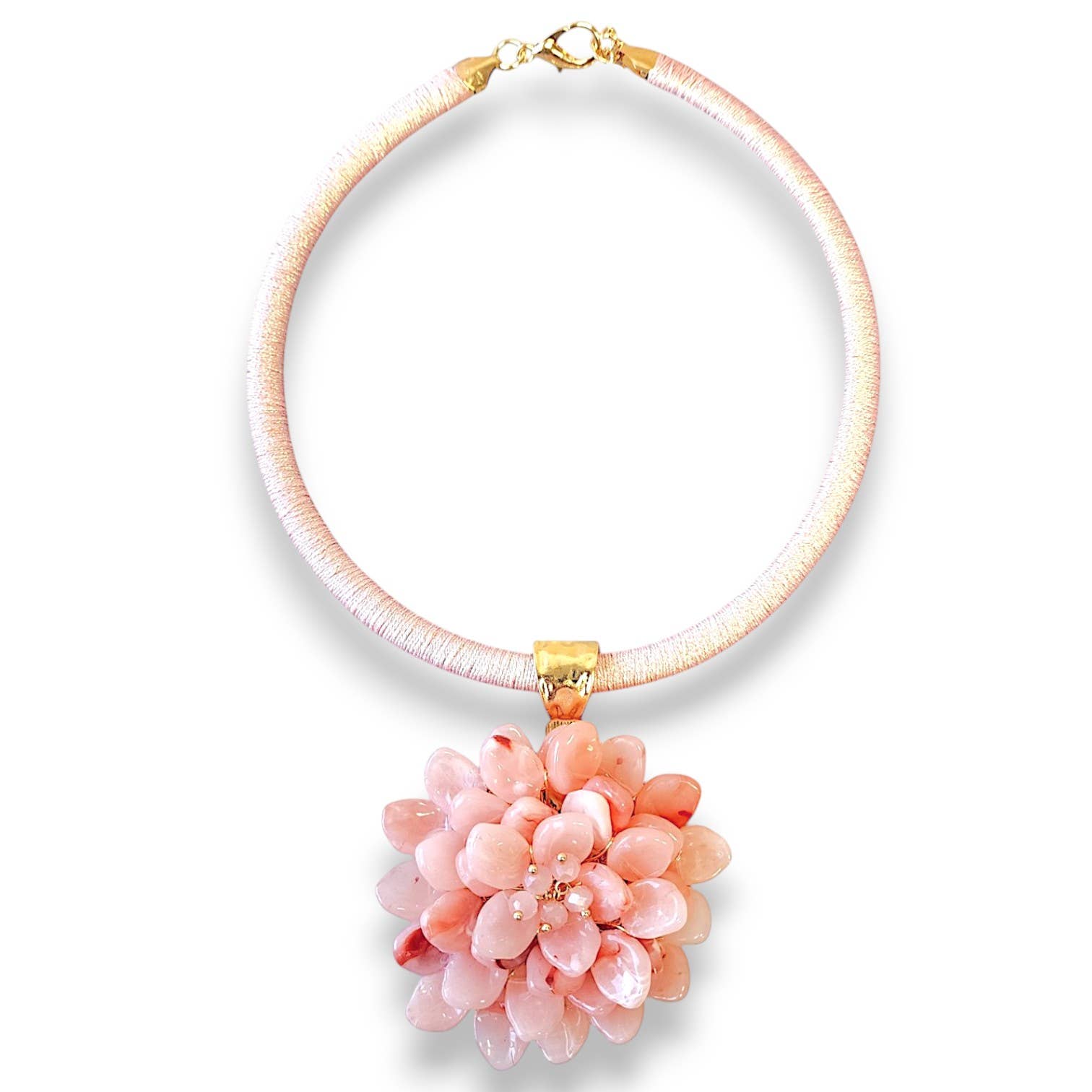 Necklace with a pink floral pendant on a white background