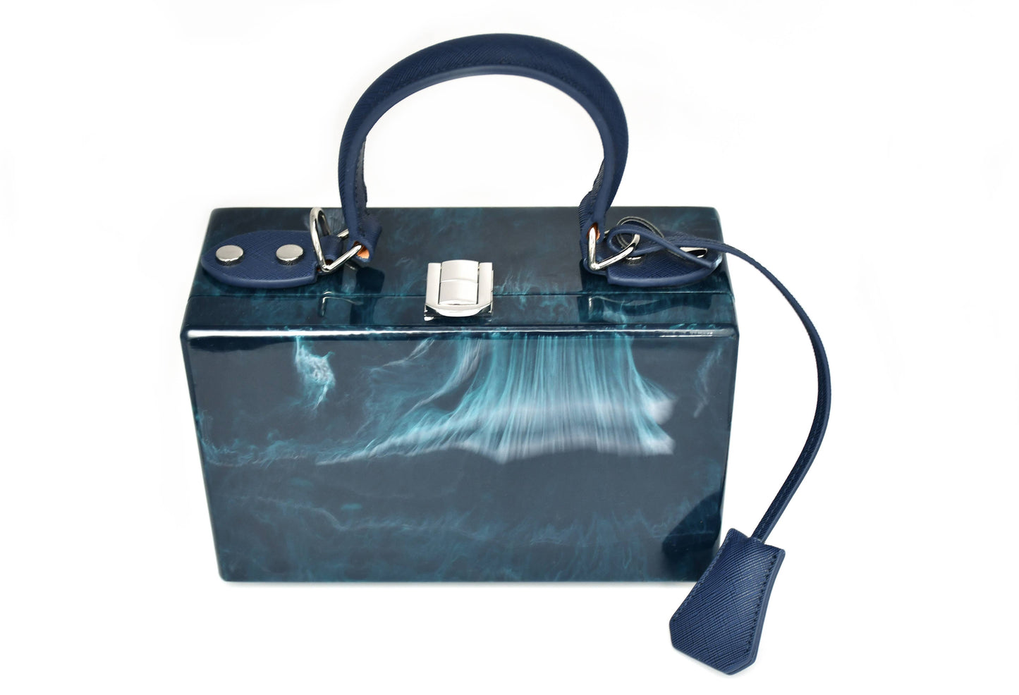 Blue handbag with a strap on a white background