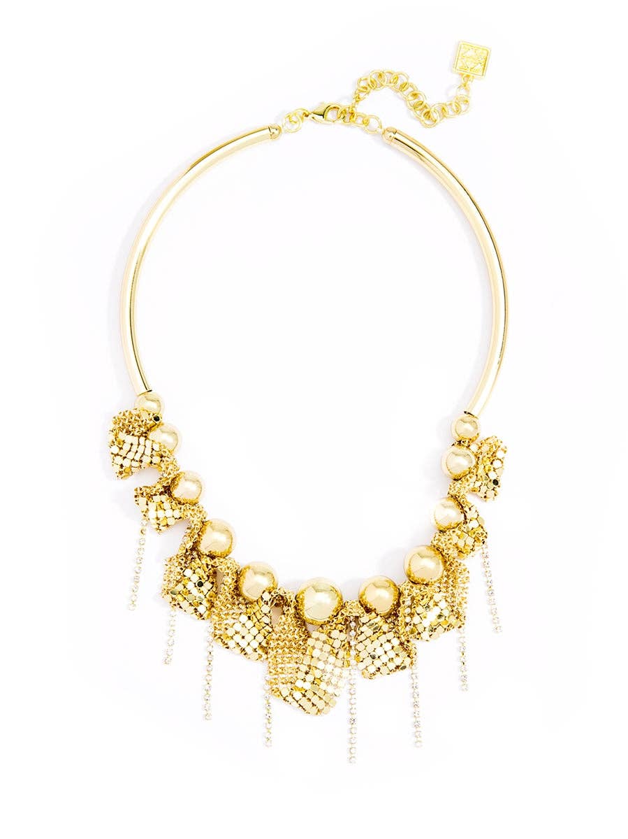 Gold necklace with intricate design on a white background