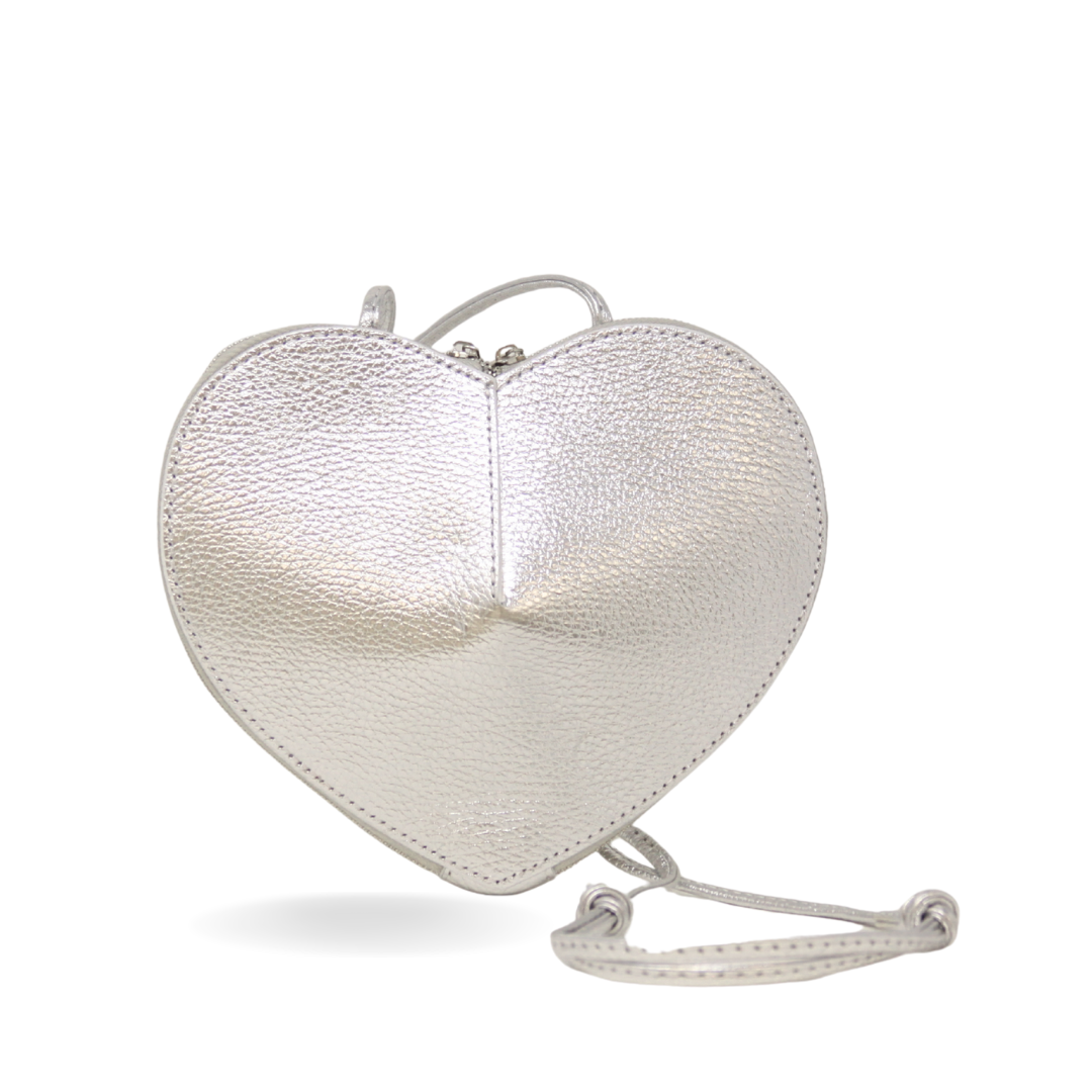 Heart-shaped silver clutch bag on a white background