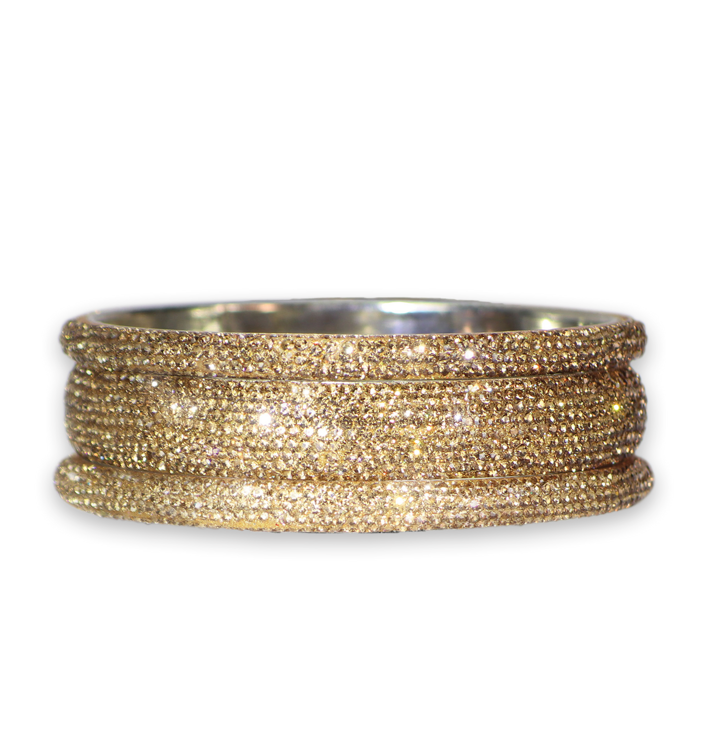 Gold bangle on a white background
