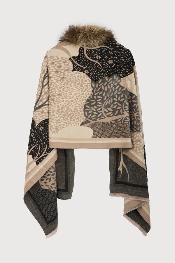 Patterned scarf with fur hood on a white background